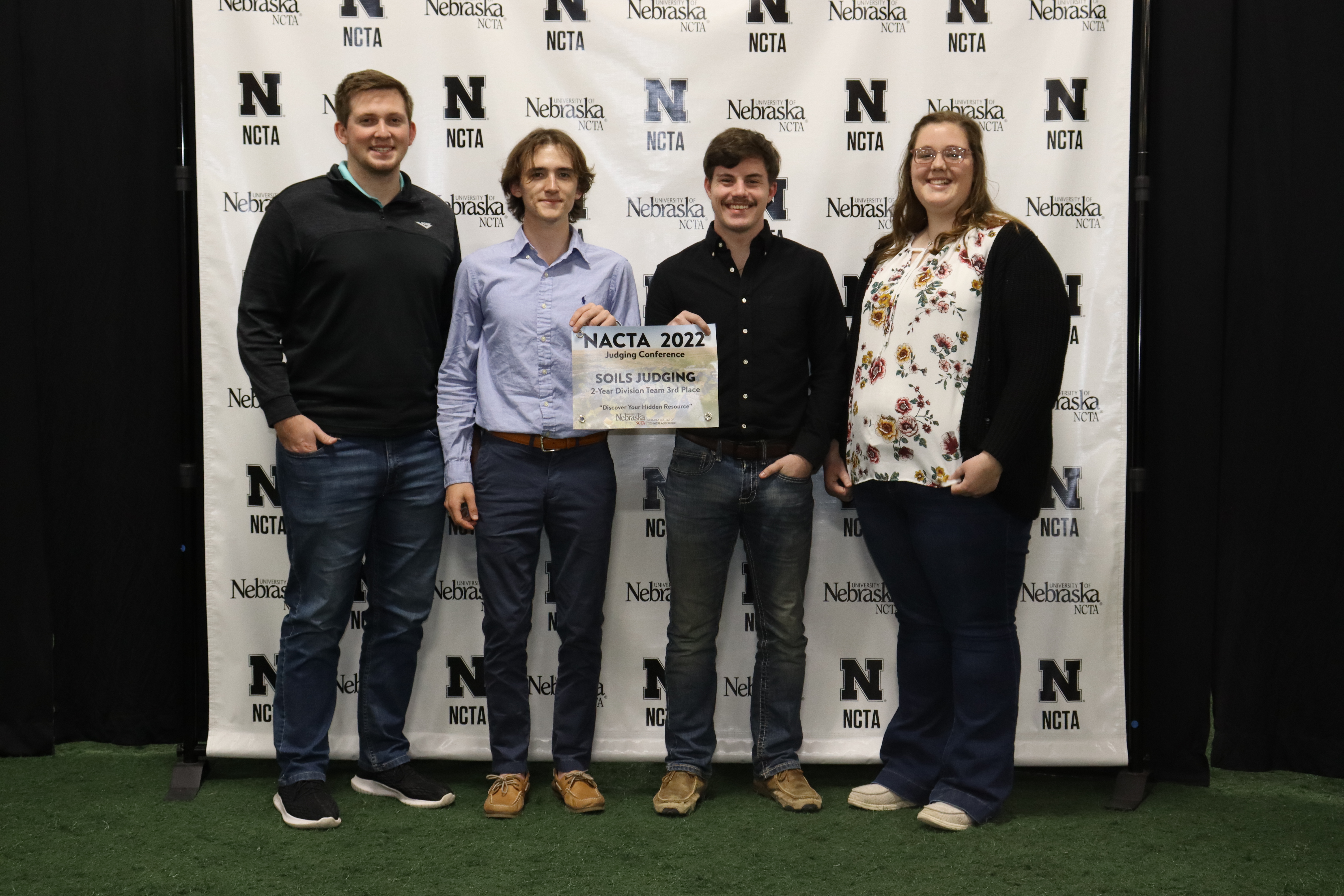 Students on the VU Soils Judging Team poses with the third-place award in front of NACTA background